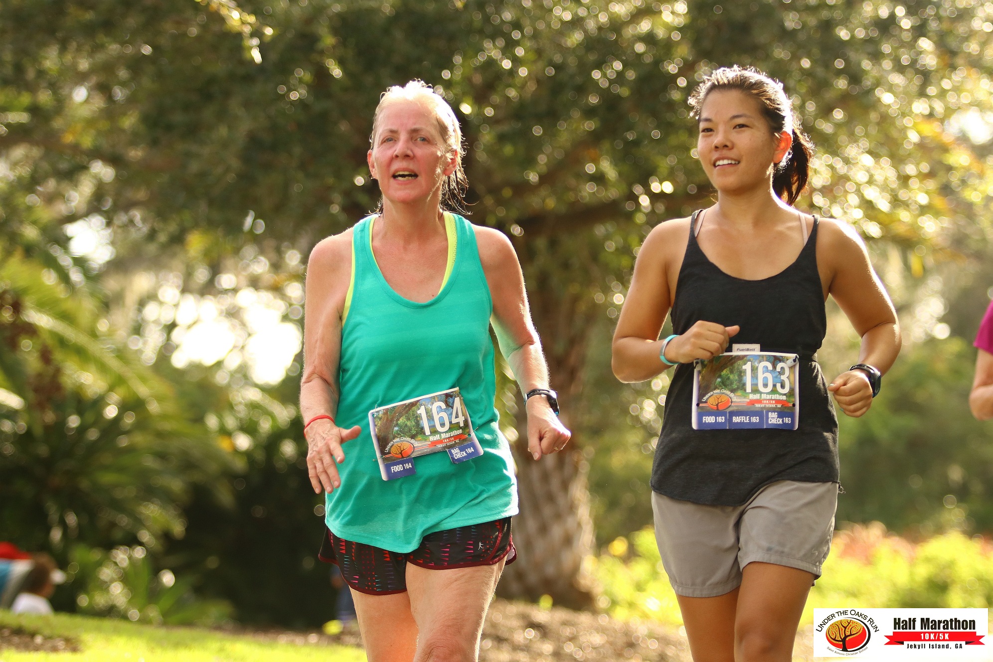 Mom and I finishing at Under the Oaks 10K